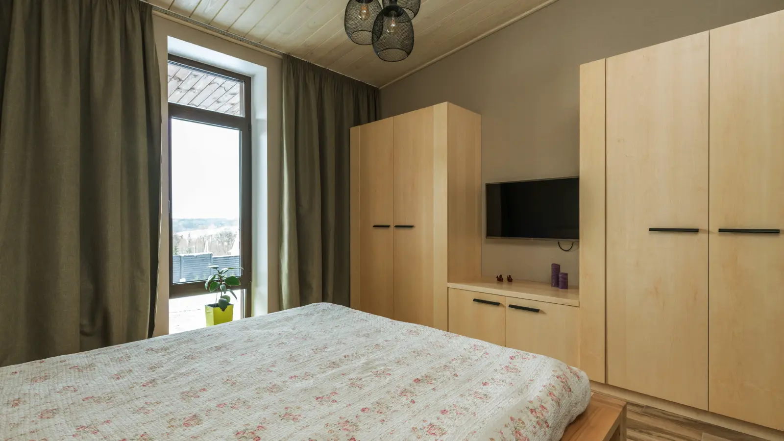 Fitted wardrobe in a Dubai villa bedroom.